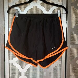 Nike Black and Orange Athletic Shorts with Breathable Fabric